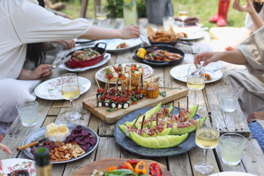 An assortment of food and wine at a wine tasting